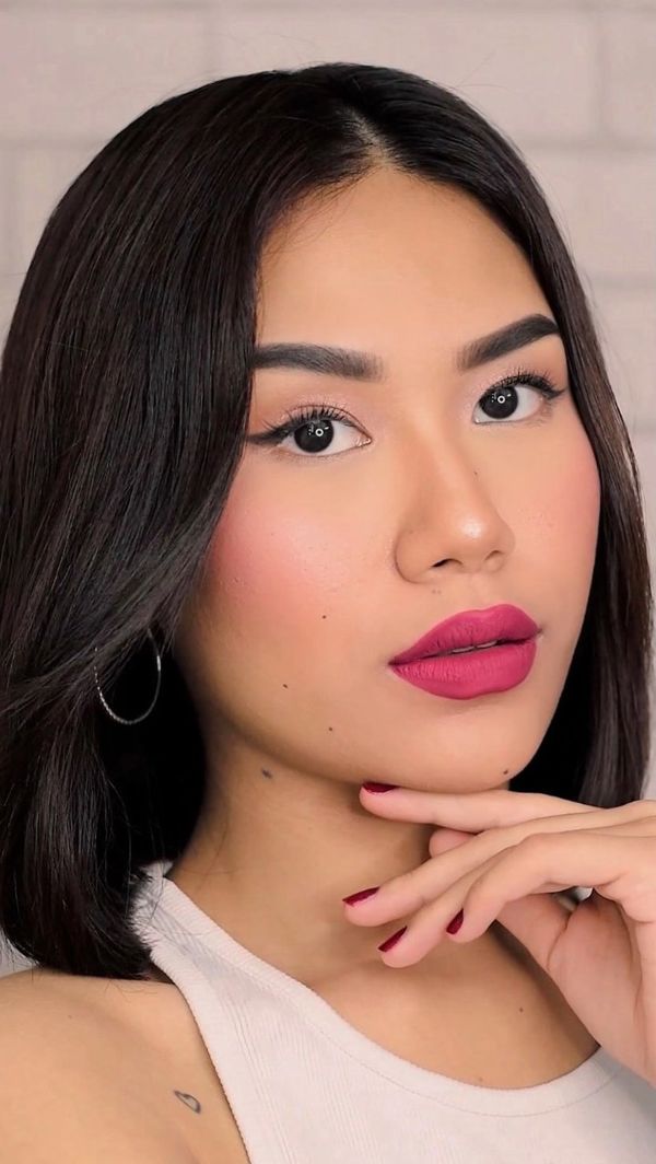 Kaybe in a berry lip look